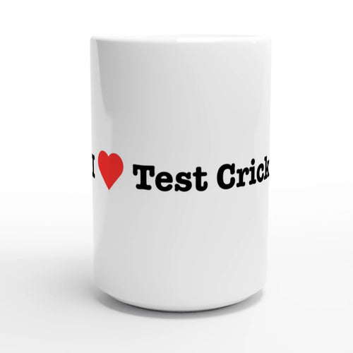 A white ceramic mug with the text 'I' followed by a red heart icon and 'Test Crick' in black font.