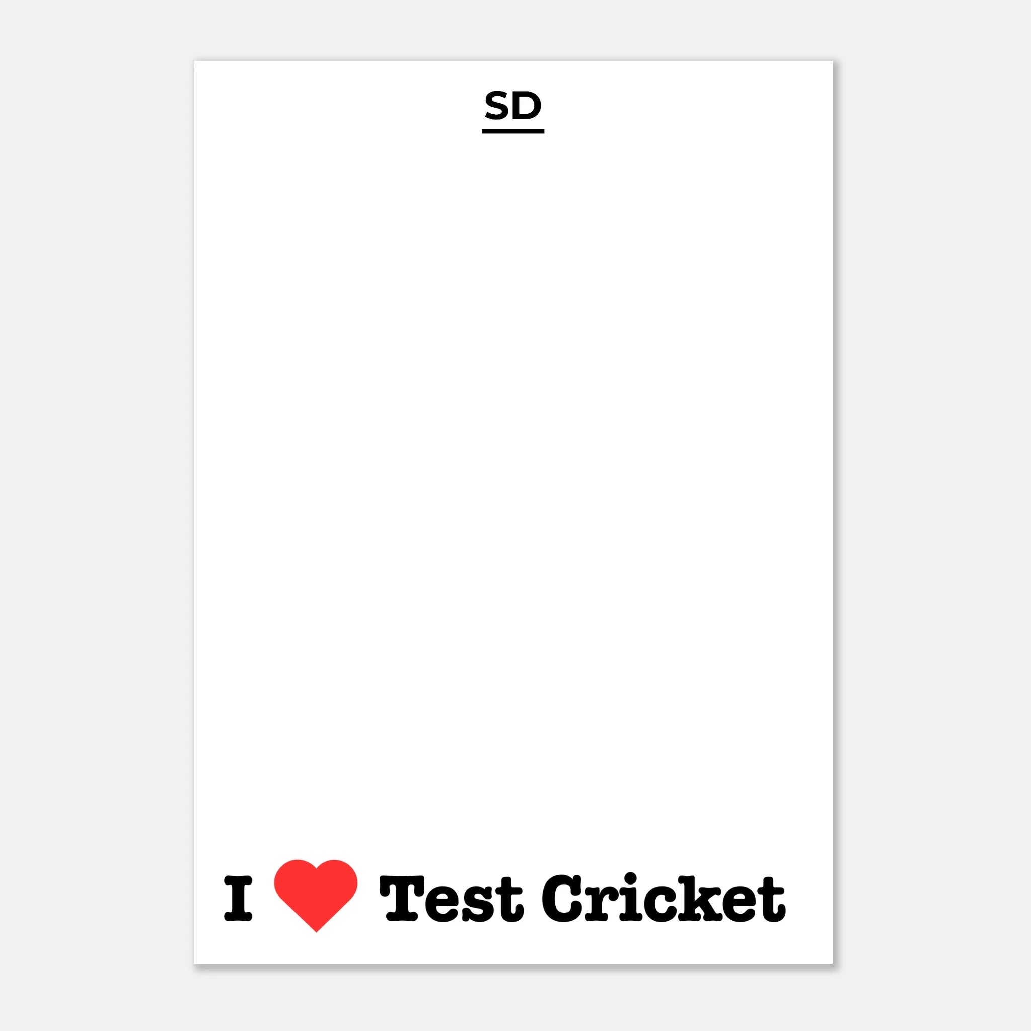 A white rectangular poster with the text 'I' followed by a red heart and 'Test Cricket' in black. The top of the poster has the small text 'SD'.